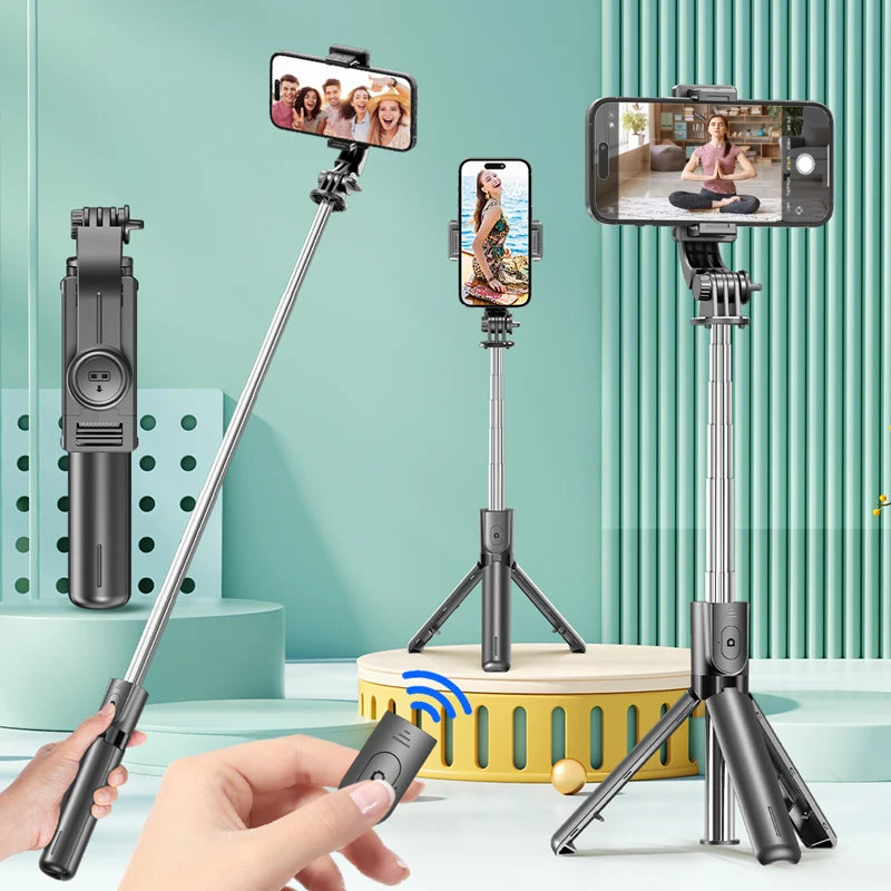 A hand holds a versatile selfie stick tripod with a smartphone mounted on it, set against a light green background.
