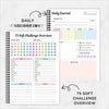 A daily journal notebook with pages for tracking and reflection, featuring a title Daily Journal.