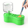 A green paint brush cleaning set with a glass jar and a blue brush is shown.