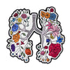 Enamel pins depicting stylized trees with various flowers and leaves for medical professionals