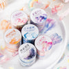 A collection of six rolls of kawaii cloud pattern masking tape in various pastel colors arranged on a white plate.