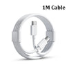 A white 1M cable coiled and shown with its connector end.