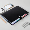 A black A4 7-story colorful document organizer bag is shown with a calculator and pencils on a light gray surface.