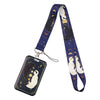 A dark blue cartoon cat card holder attached to a lanyard with a repeating pattern of cats and moons.
