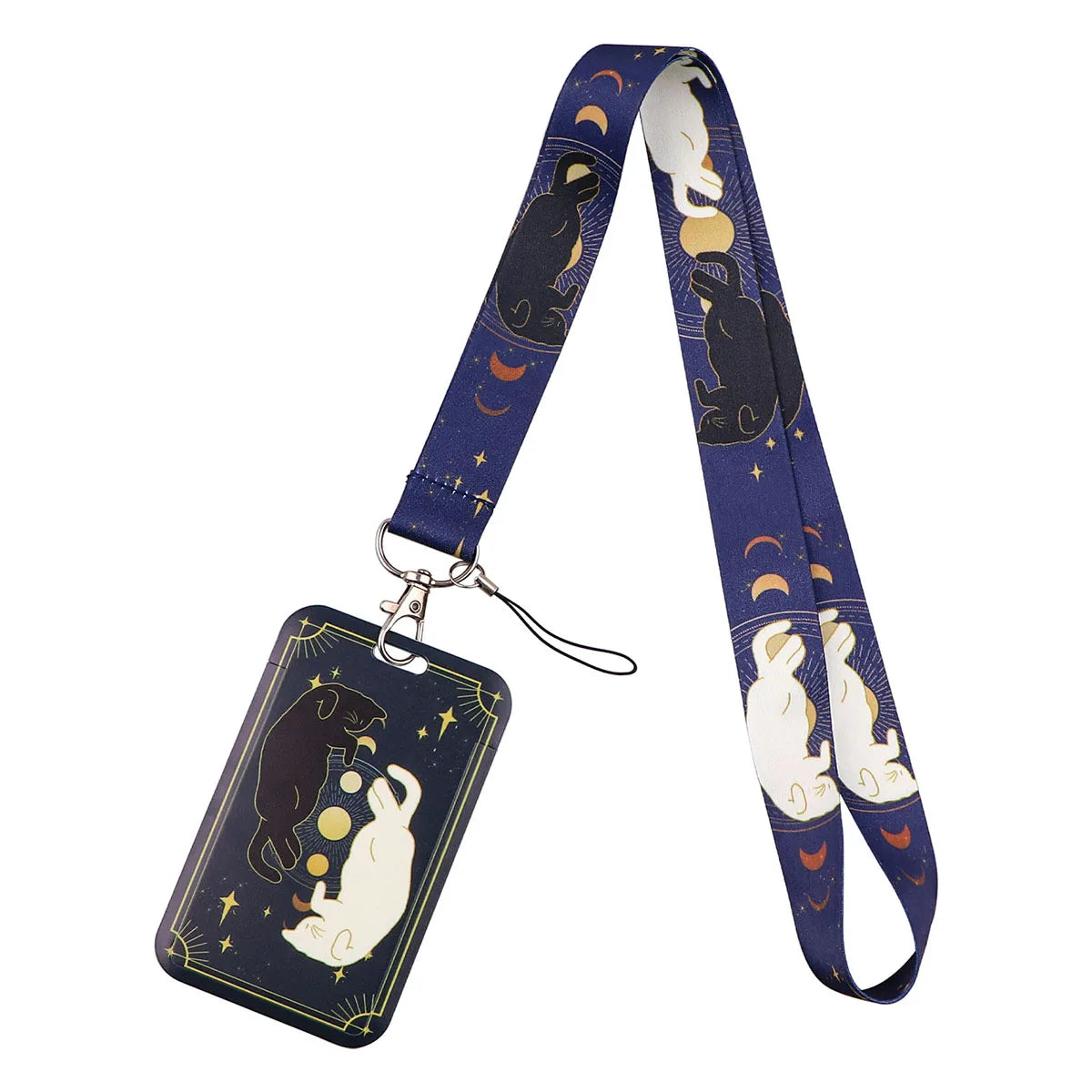 A dark blue cartoon cat card holder attached to a lanyard with a repeating pattern of cats and moons.