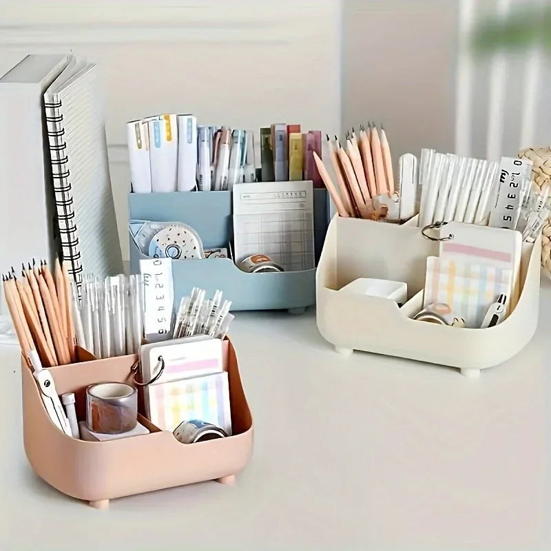 Una colección de organizadores de escritorio y suministros de papelería de acrílico en varios colores pastel exhibidos en un 