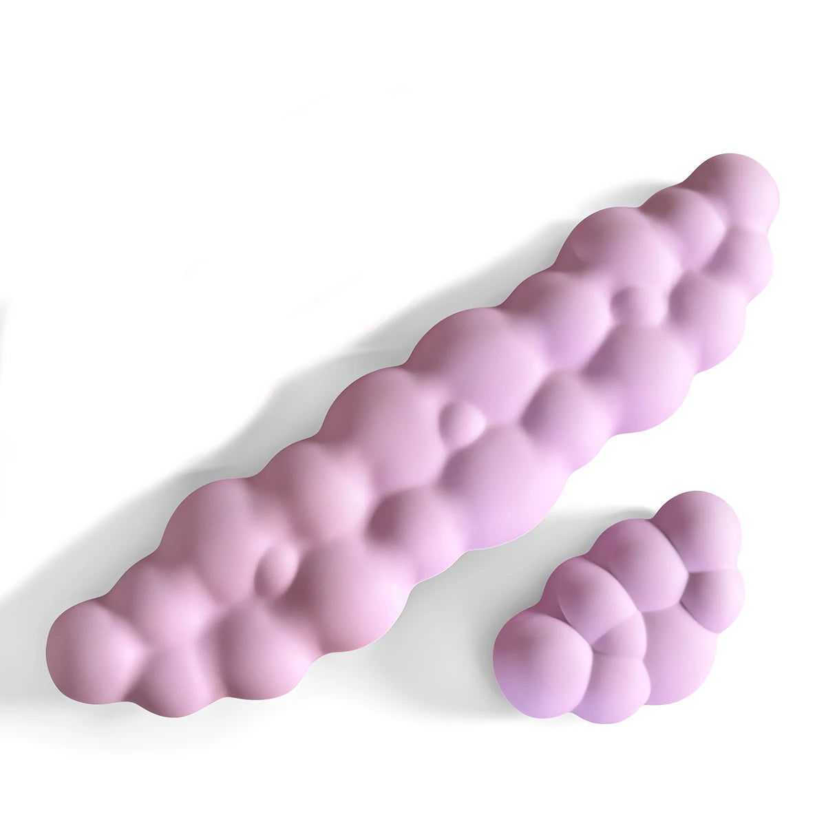 A light purple ergonomic memory foam wrist rest pad shaped like a hand, shown from the side.