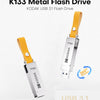 A silver Kodak USB 3.1 flash drive with an orange leather lanyard is shown against a white background.