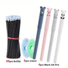 A set of black ink pens and eraser with panda-themed tips and various colors.
