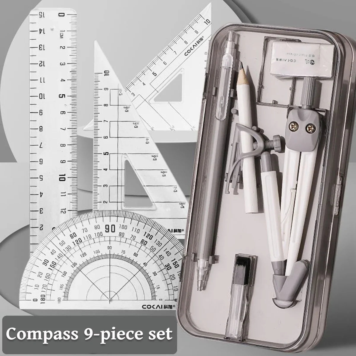 A clear plastic case containing a 9-piece compass set with various drawing tools and a ruler.