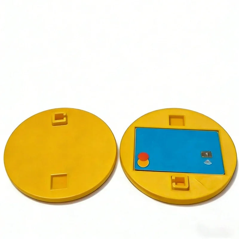 A yellow 3D printed shell card holder with NFC tap-to-pay protection features.