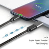 A black USB-C to USB-A adapter cable is shown next to a smartphone displaying a 10% battery charge.