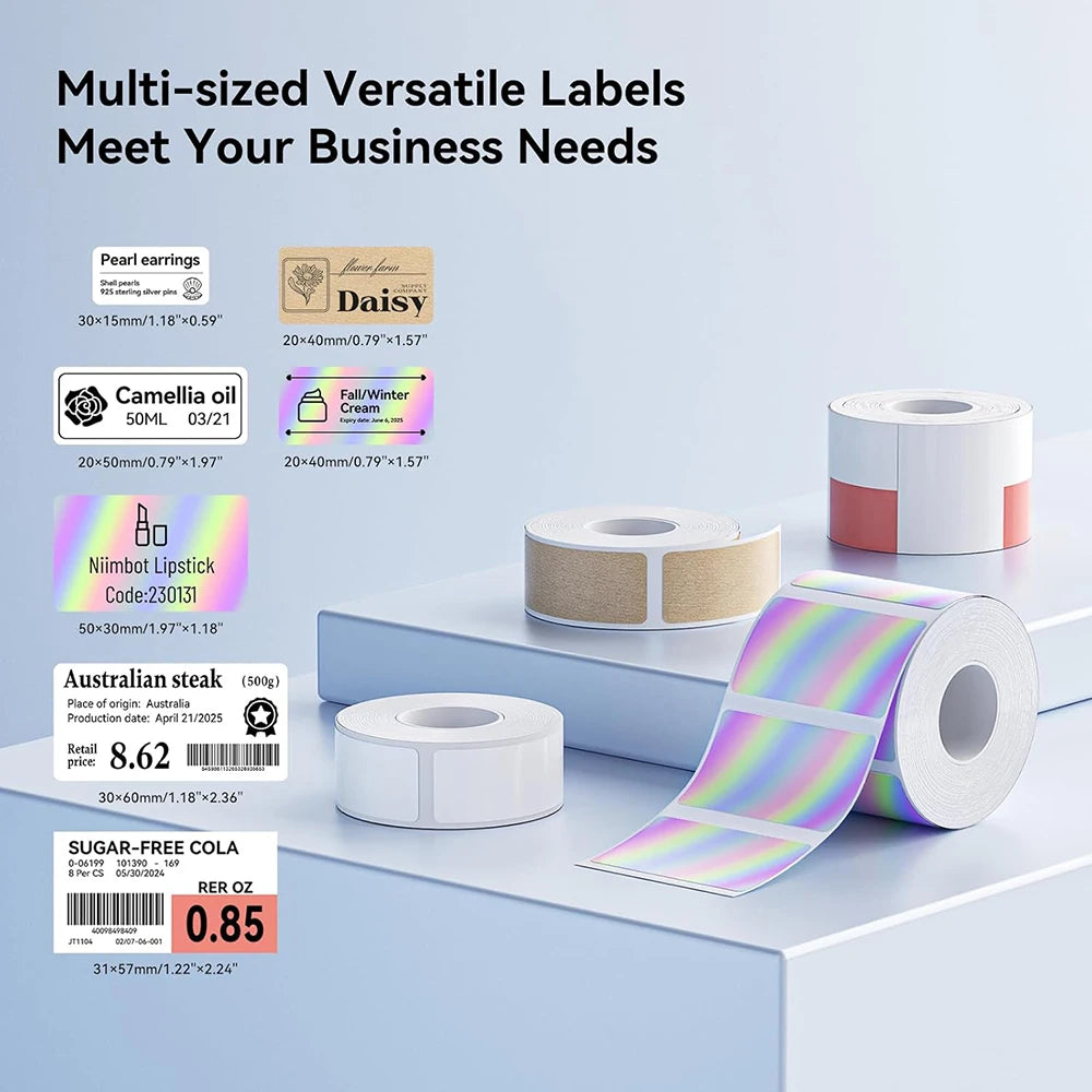A variety of multi-sized versatile labels and stickers are displayed on a white surface, including pearl earrings, a Daisy la