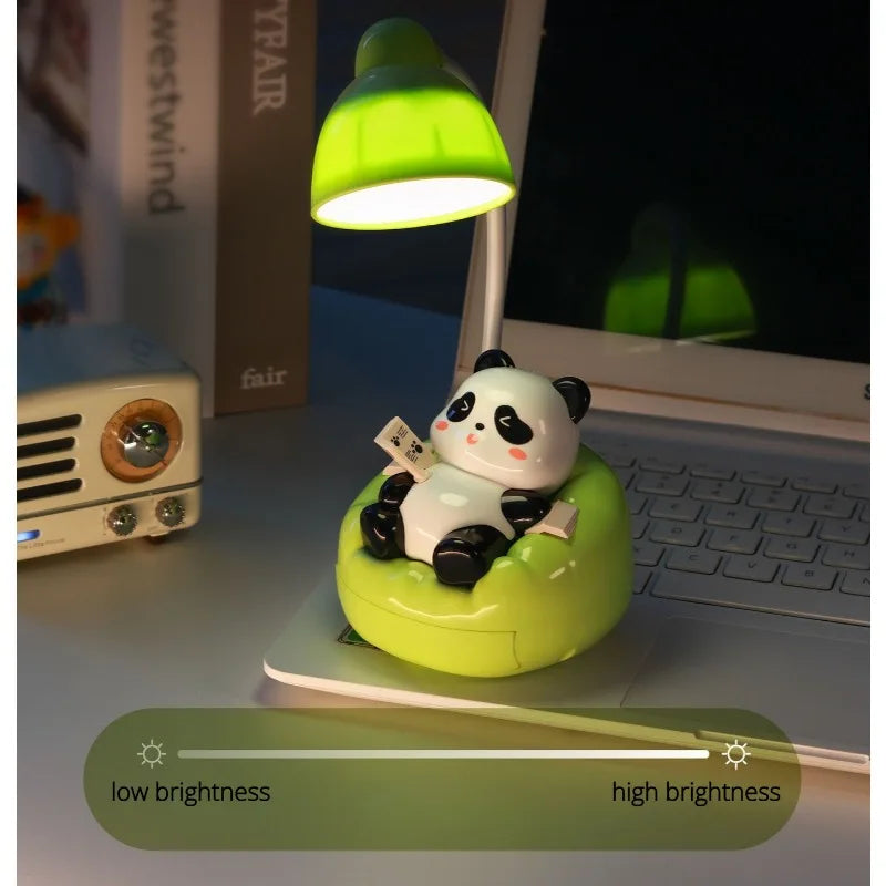 A white panda figurine sits on a lime green desk lamp, illuminating a laptop workspace.