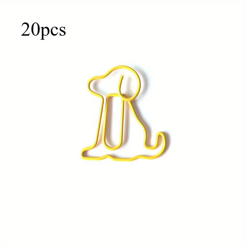 A yellow paper clip shaped like a sitting dog, part of a 20-pack desk organizer.