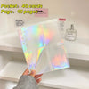 A clear plastic photo sleeve is displayed next to a perfume bottle and text indicating 40 cards and 10 pages.