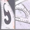 A close-up of a precision triangular drafting ruler used for drawing and measuring.