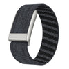 A black nylon braided strap for a watch, featuring a silver buckle and textured surface.