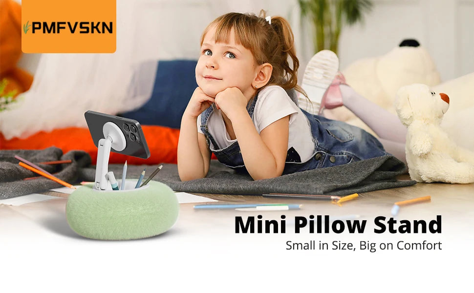 A small green pillow stand is shown next to a child and a smartphone in a home setting.