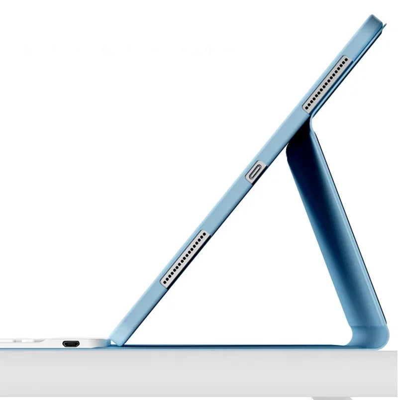 A light blue magnetic keyboard case for an iPad Pro is shown angled on a white surface.
