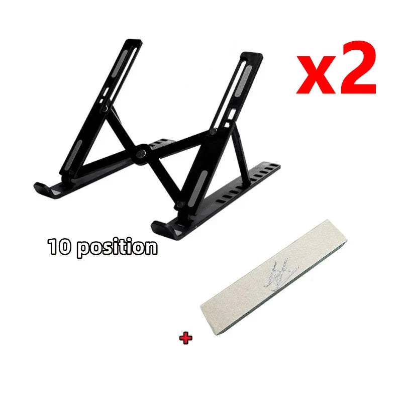 Two black foldable adjustable laptop stands and one mounting plate for a laptop stand.
