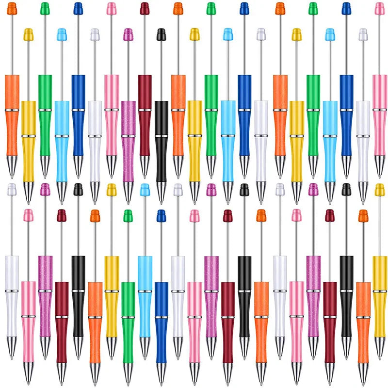 A row of 30 colorful plastic beaded ballpoint pens in various colors and designs.