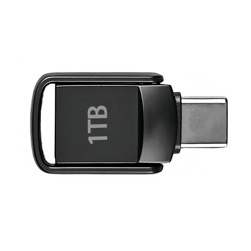 A black 1TB USB 3.2 Type-C flash drive with a metal connector and a hinged clip.
