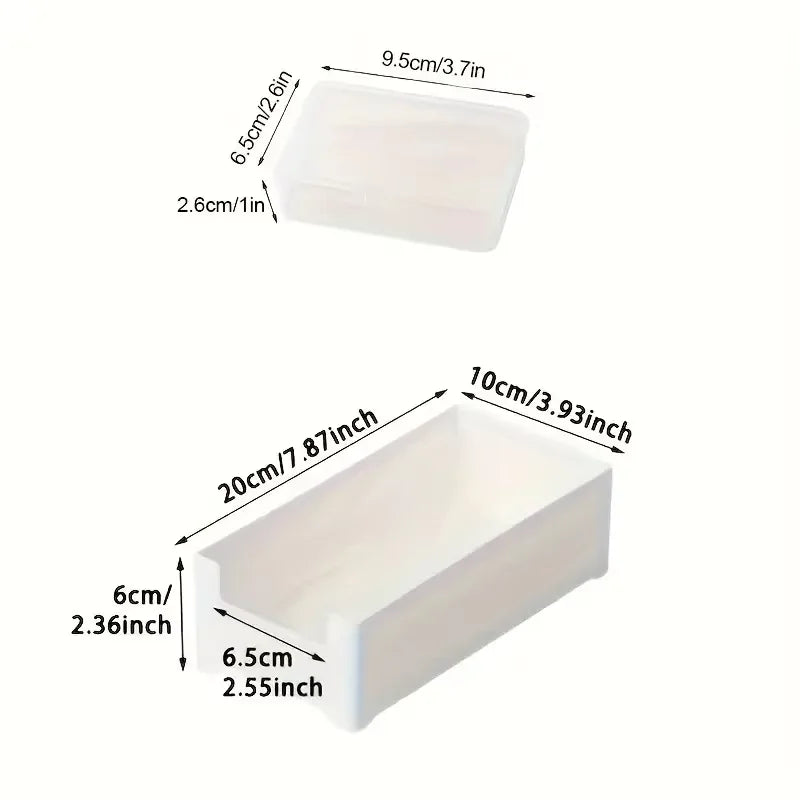 A white cable organizer storage box with dimensions 9.5cm/3.7in by 6.5cm/2.6in.