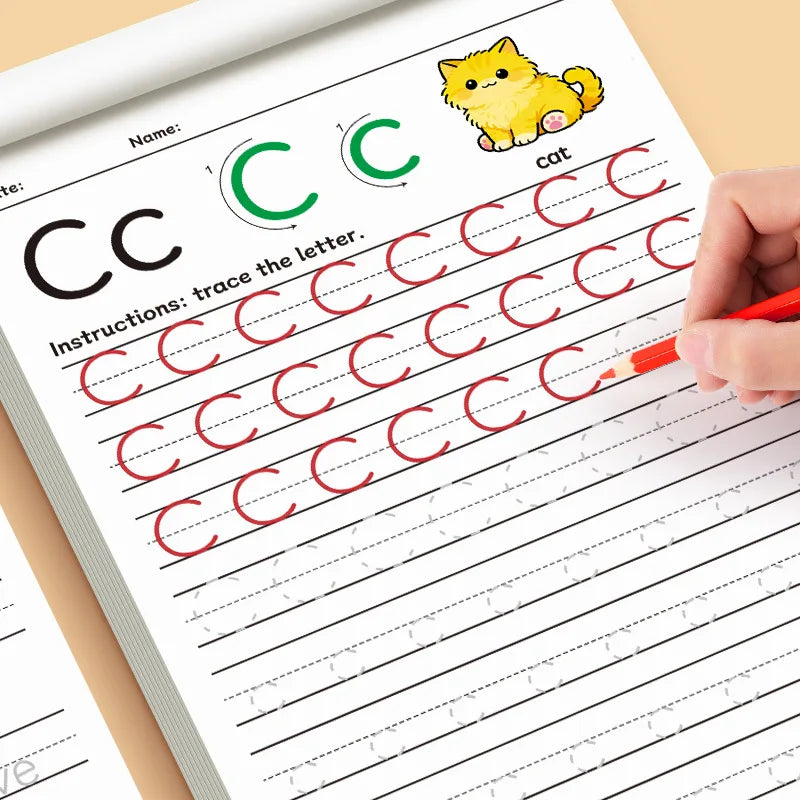 A child's hand traces the letter Cc on a workbook page with red pencil lines for tracing practice.