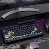 A mechanical keyboard featuring translucent Ukiyo-e keycaps is displayed on a dark surface with a smartphone nearby.