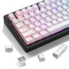 A close-up view of a black mechanical keyboard featuring white keycaps with side-printed legends and purple glow.
