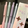 A pack of four pastel gradient gel pens with black ink, featuring pink, mint green, purple, and blue shades.