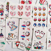 Colección de pegatinas temporales con diseños multi, estampados de animales y flores lindos.