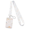 A white lanyard with a pastel rainbow cloud pattern attached to an ID badge holder.
