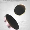 A round, black magnetic holder with a silver rim is shown against a white background.