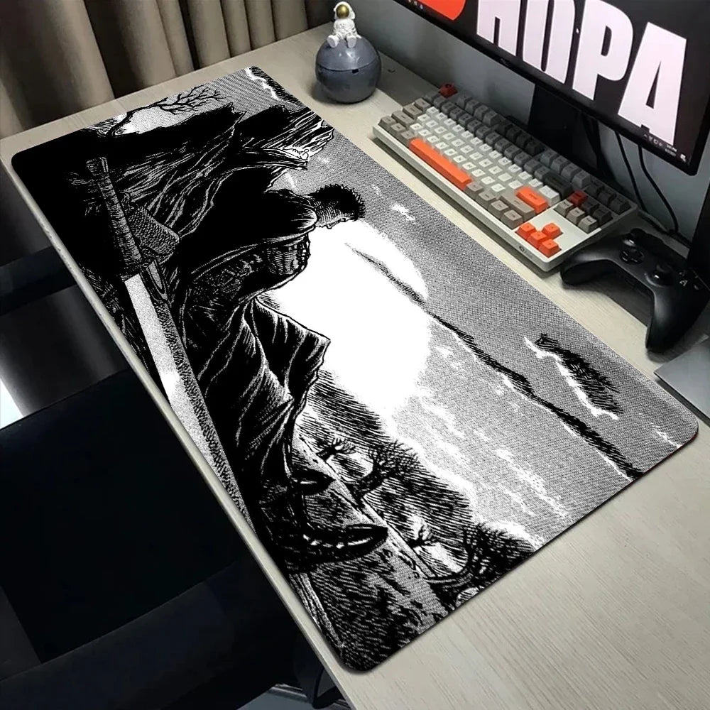 A large black and white anime illustration of a character from Berserk on a gaming desk mat.