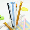 A set of six cute animal-themed erasable gel pens in various colors including blue, white, and orange.