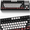 A close-up view of a black mechanical keyboard with red and white PBT keycaps and backlighting.