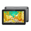 A black digital drawing tablet with a screen protector displaying a vibrant outdoor scene.