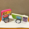 A pink and yellow magnetic ring stand shockproof phone case with camera protection displayed on a white surface.