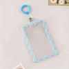 Clear acrylic card holder with a blue key ring attached, displayed on a white surface.