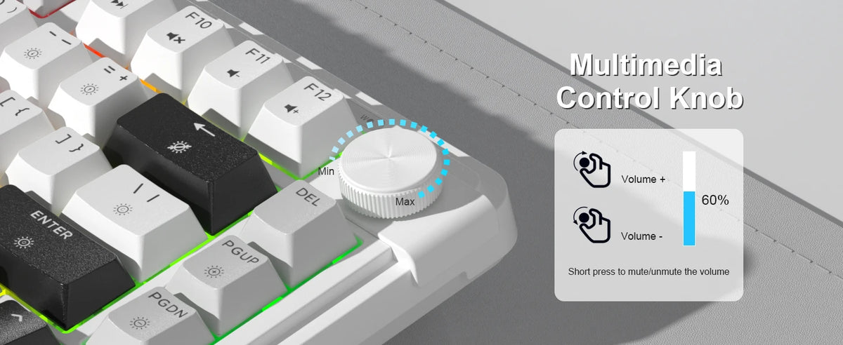 Vista cercana de un teclado de membrana RGB compacto con perilla giratoria de control multimedia para ajuste de volumen.