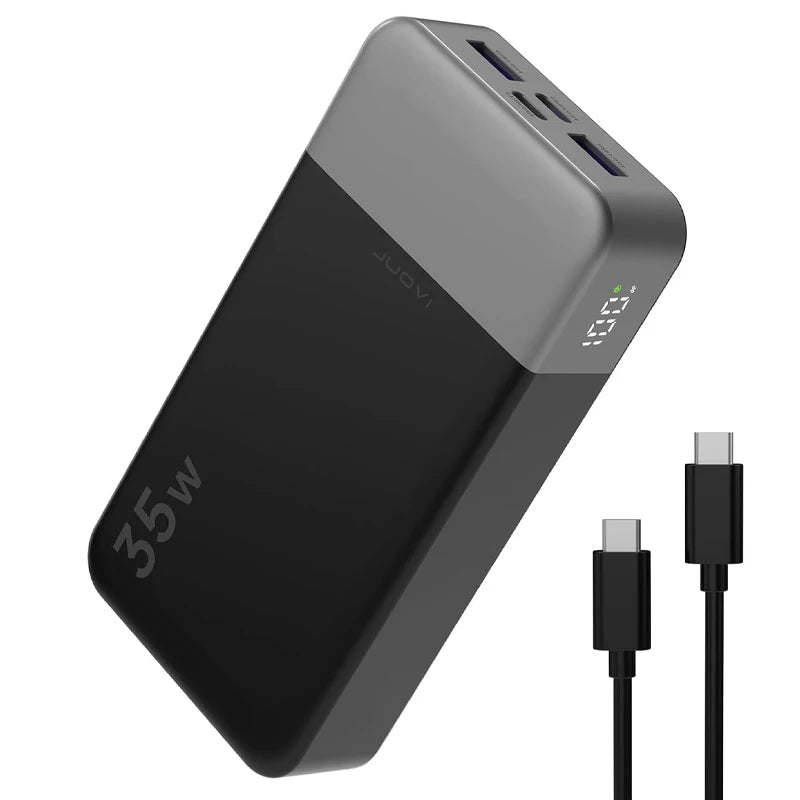 A black 35W fast charging power bank with an LED display is shown from a top-down angle.