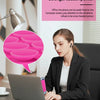 A woman is using a silicone suction cup phone holder on a laptop in an office setting.