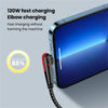 A close-up of a black braided USB-C to Type-C charging cable connected to a smartphone during fast elbow charging.