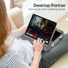 A person is using a foldable tablet with a stand to watch movies while relaxing on a couch.