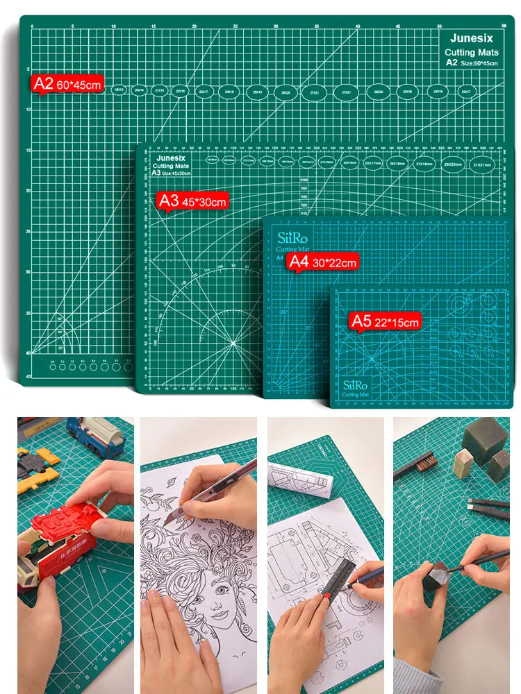 A set of green cutting mats with grid guides and various tools being used for crafting or cutting.