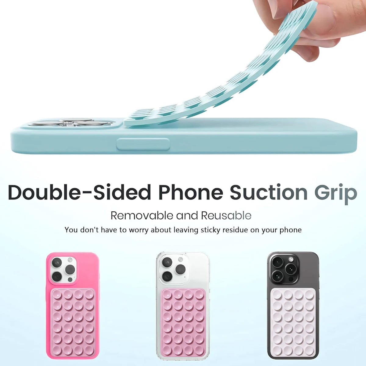 Una mano sostiene un agarre de succión para teléfono azul claro de doble cara, mostrando varios modelos de smartphones rosa y