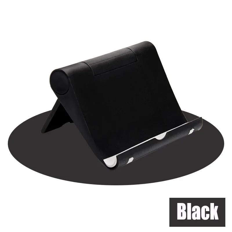A black flexible multi-angle tablet and phone desk stand shown from above.