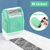 A green reusable confidential roller stamp is shown next to a black barcode print on a white surface.